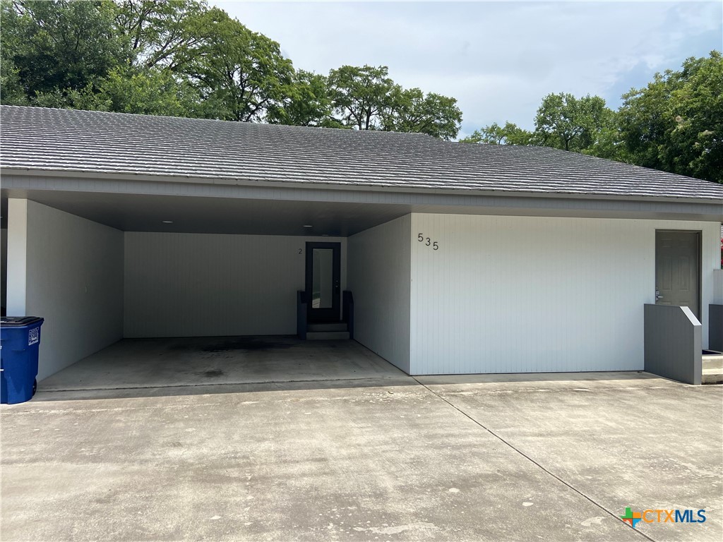 535 Ski Lodge Road, Unit 2 McQueeney, TX 78123 - Photo 9 of 10 a backyard of a house