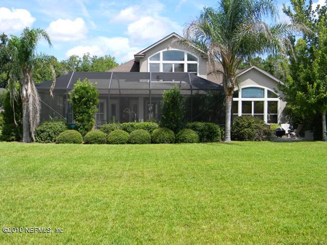 1929 Summit Ridge Road Fleming Island, FL 32003 - Photo 29 of 55 Rear View of Home & Lawn