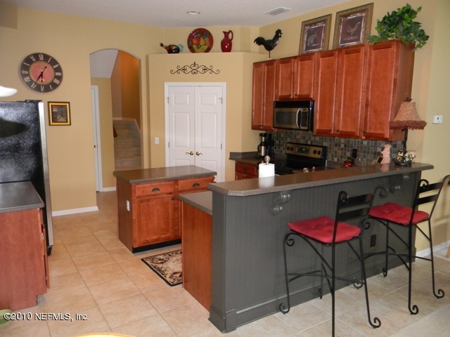 1929 Summit Ridge Road Fleming Island, FL 32003 - Photo 10 of 55 Kitchen Breakfast Bar