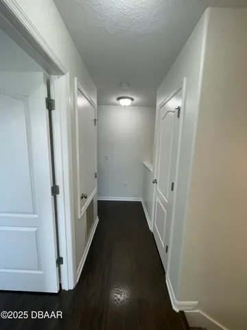 a view of hallway with stairs