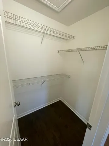 a view of a room with racks on the wall