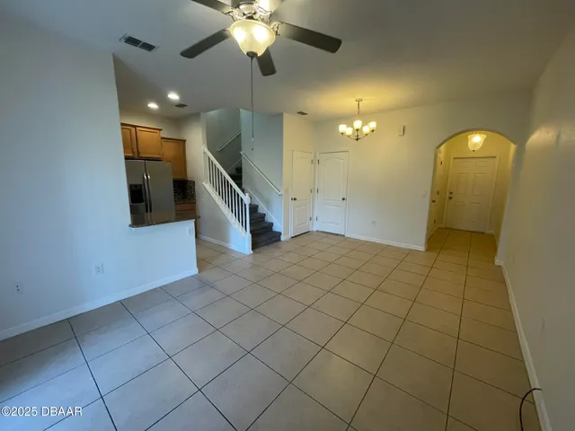 wooden floor in an empty room with a mirror