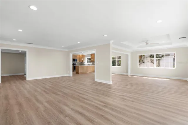 a view of entryway with wooden floor and stairs