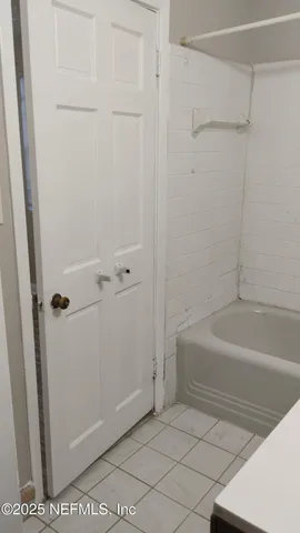 a bathroom with a bathtub