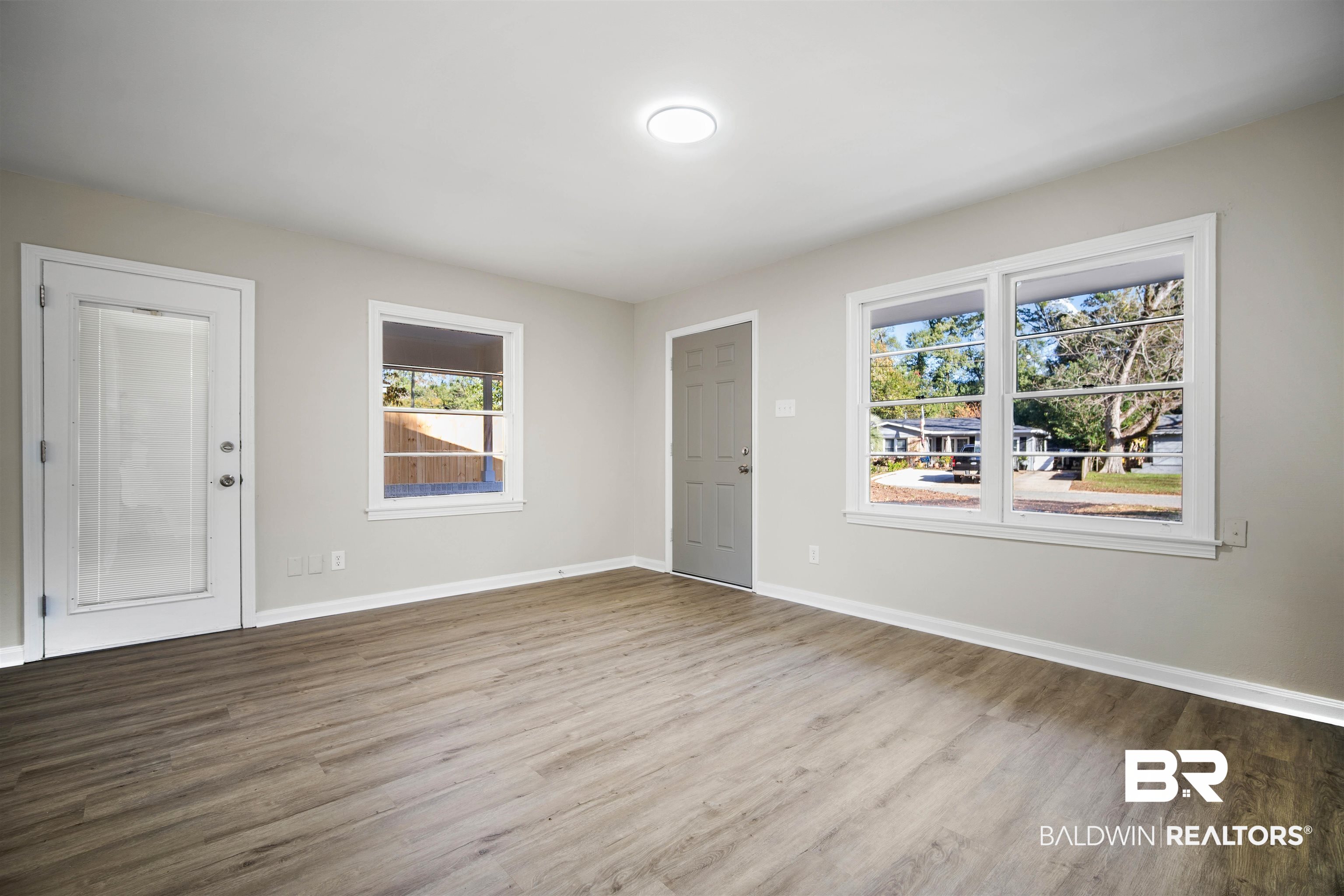 662 Merritt Drive Mobile, AL 36609 - Photo 5 of 21 Empty room featuring hardwood / wood-style flooring