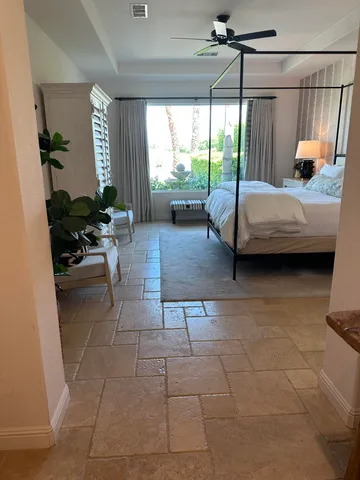 a living room with patio furniture