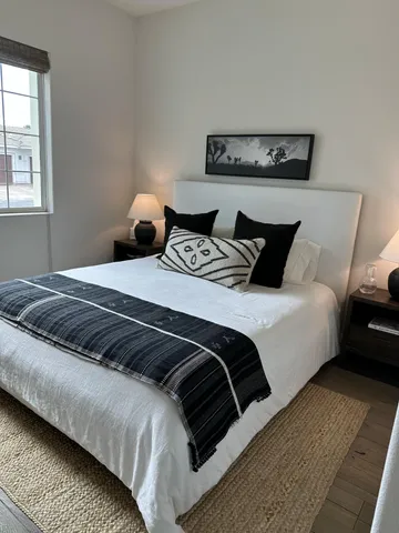 a bathroom with a white toilet and a shower