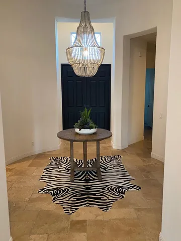 a view of a chandelier in a livingroom