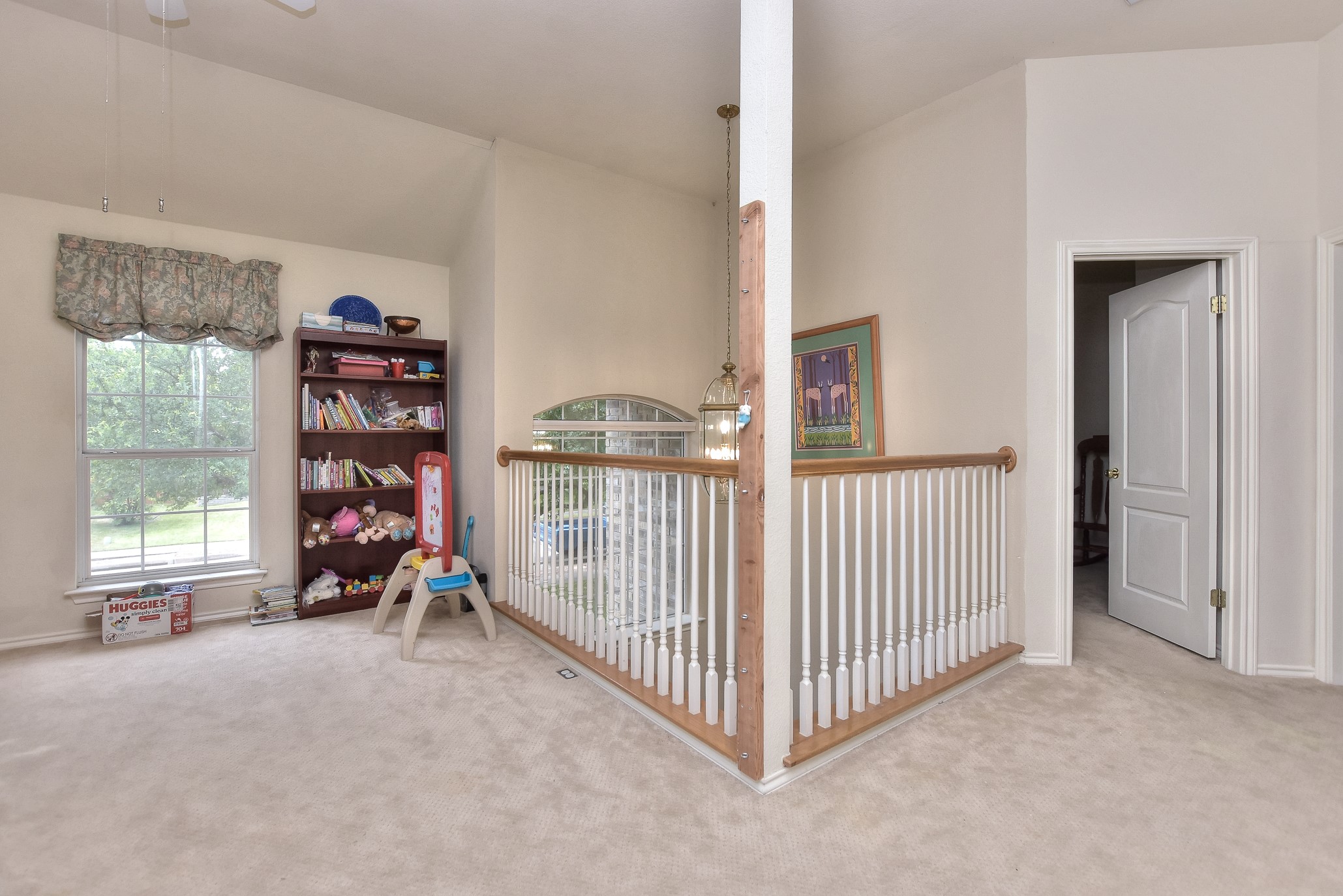 1609 Colton Way Cedar Park, TX 78613 - Photo 22 of 24 A versatile upstairs loft with vaulted ceilings and abundant natural light.