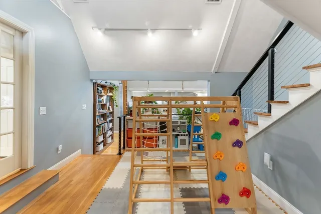 a room with lots of white furniture