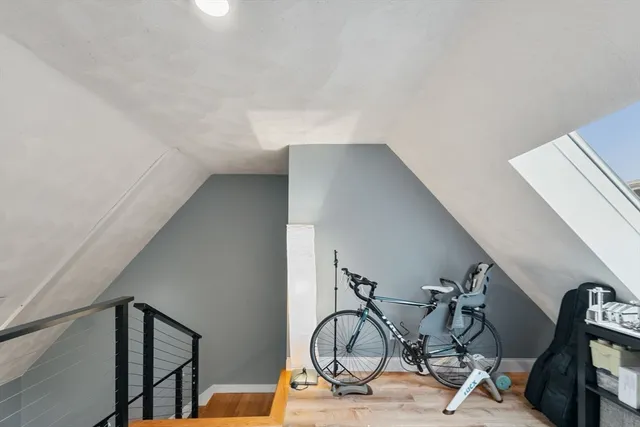 a view of an entryway with wooden floor