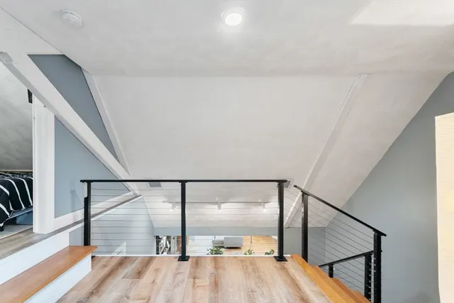 a view of entryway with wooden floor