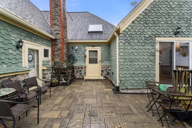 a view of house with patio outdoor seating