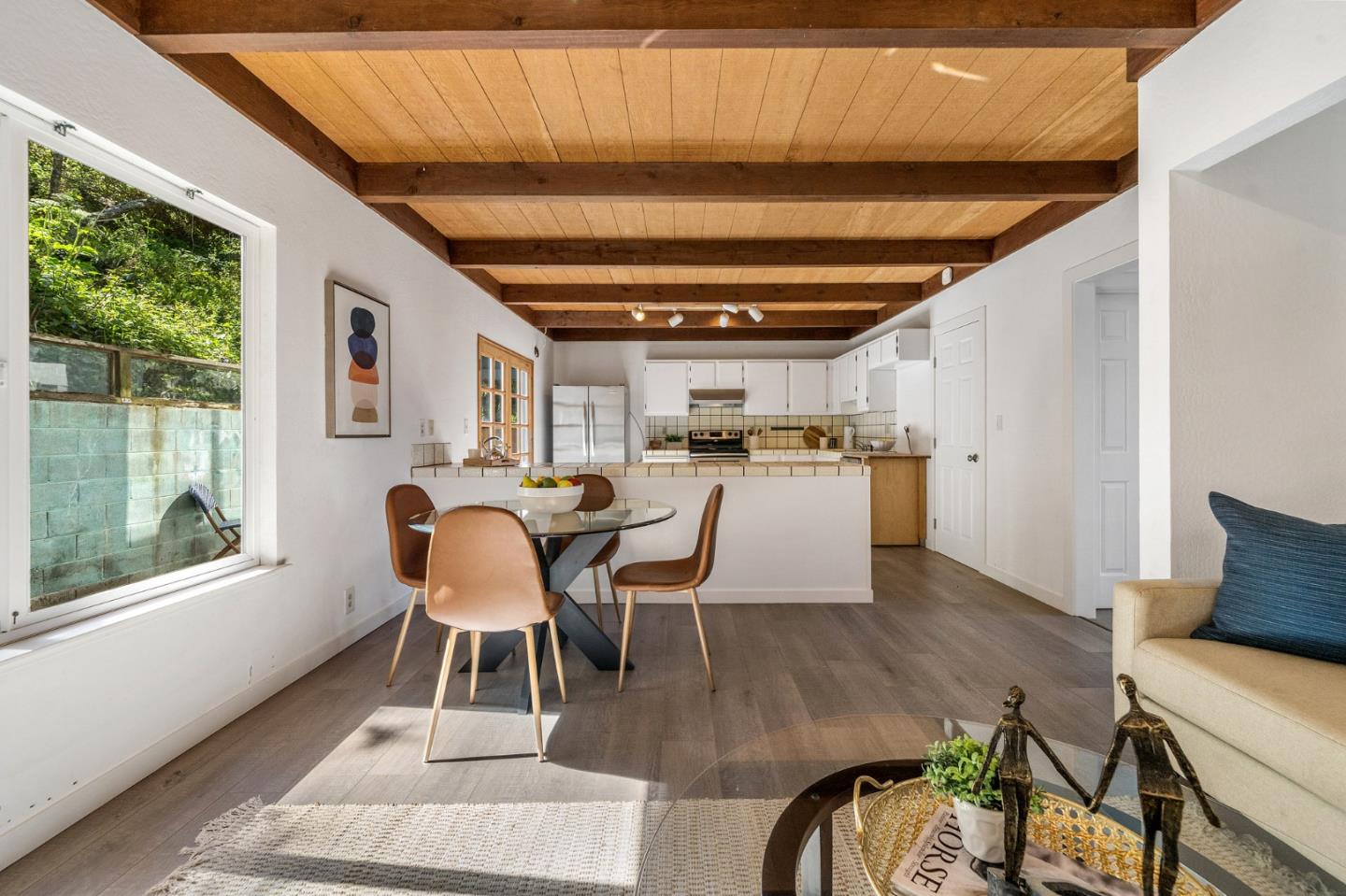 290 Olympian Way Pacifica, CA 94044 - Photo 12 of 33 a dining room with furniture and wooden floor