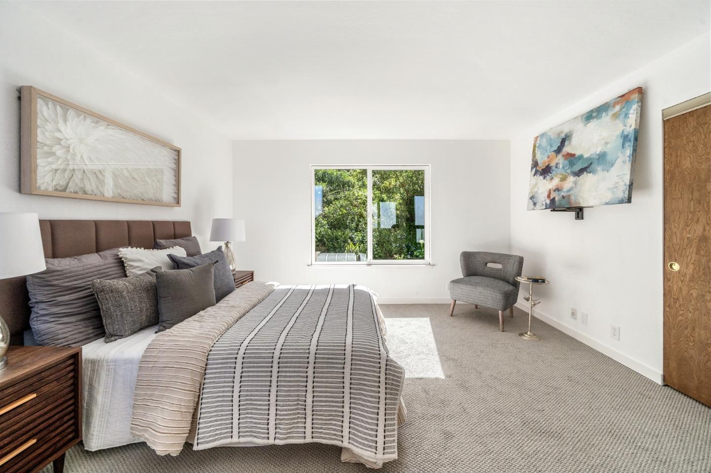 290 Olympian Way Pacifica, CA 94044 - Photo 18 of 33 a bedroom with a bed and a couch