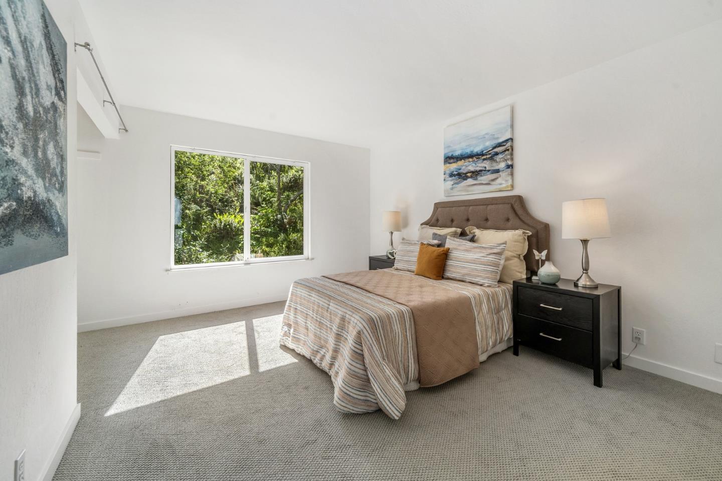 290 Olympian Way Pacifica, CA 94044 - Photo 20 of 33 a bedroom with a bed and a window