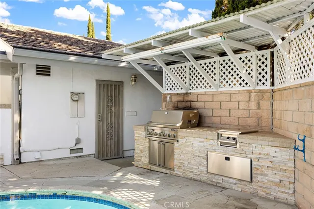 a view of a kitchen with appliances