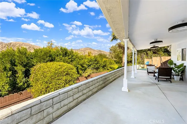 a view of couches in the balcony