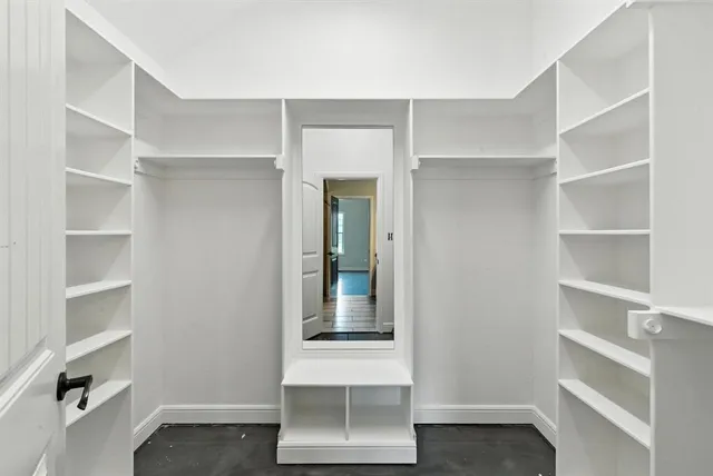 a view of an empty walk in closet