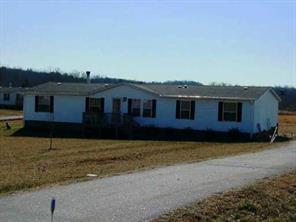 967 Tot Dellinger Road Cherryville, NC 28021 - Photo 2 of 7 a view of a house with a backyard