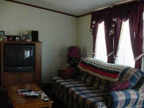 967 Tot Dellinger Road Cherryville, NC 28021 - Photo 3 of 7 a living room with furniture and a window