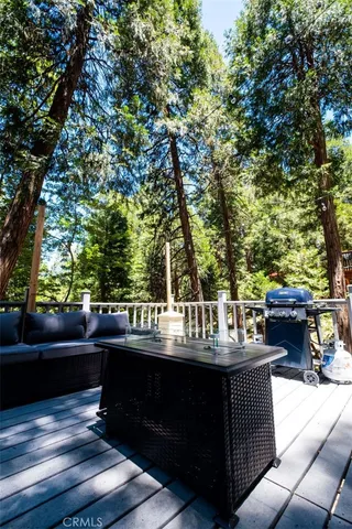 a view of a couches and table in the patio