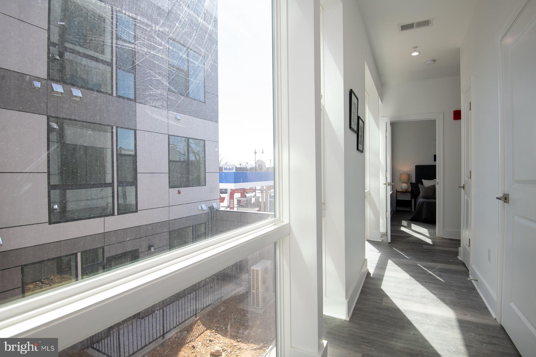 818 Bladensburg Road Northeast, Unit 203 Washington, DC 20002 - Photo 13 of 13 a view of a kitchen with a sink and a refrigerator