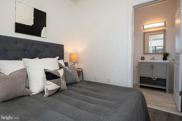 a bedroom with furniture and window