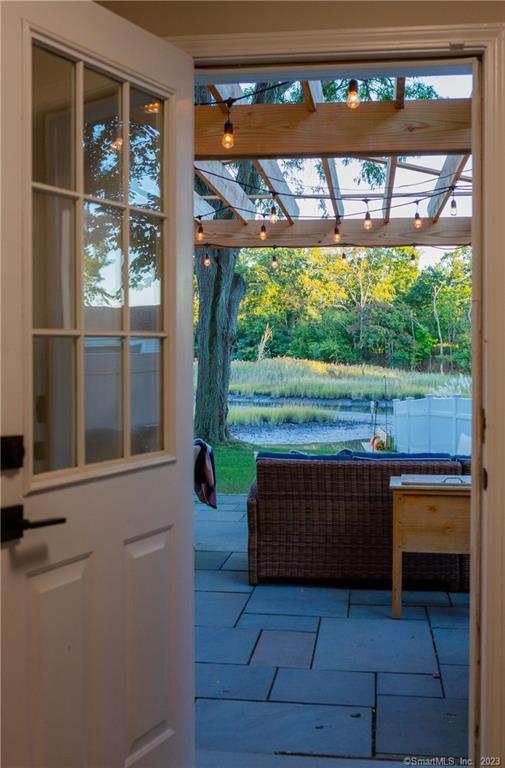 331 Riverside Drive Fairfield, CT 06824 - Photo 26 of 34 a view of a porch with furniture and yard