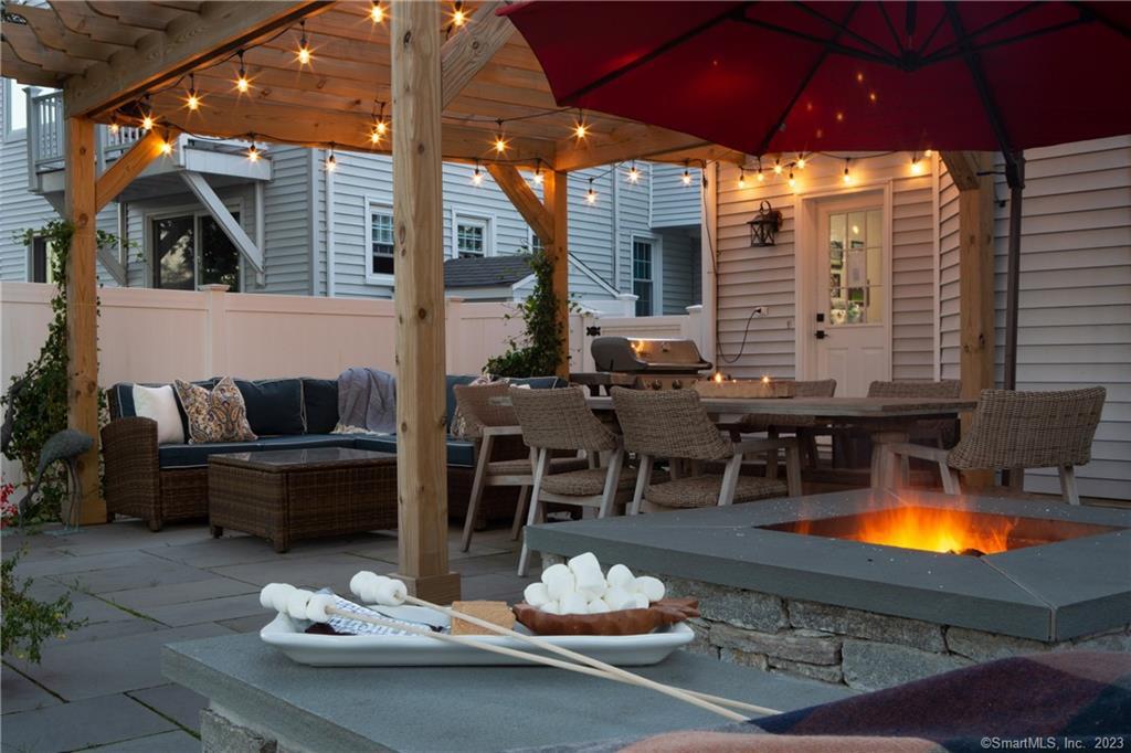 331 Riverside Drive Fairfield, CT 06824 - Photo 30 of 34 a view of a swimming pool with a patio and a yard