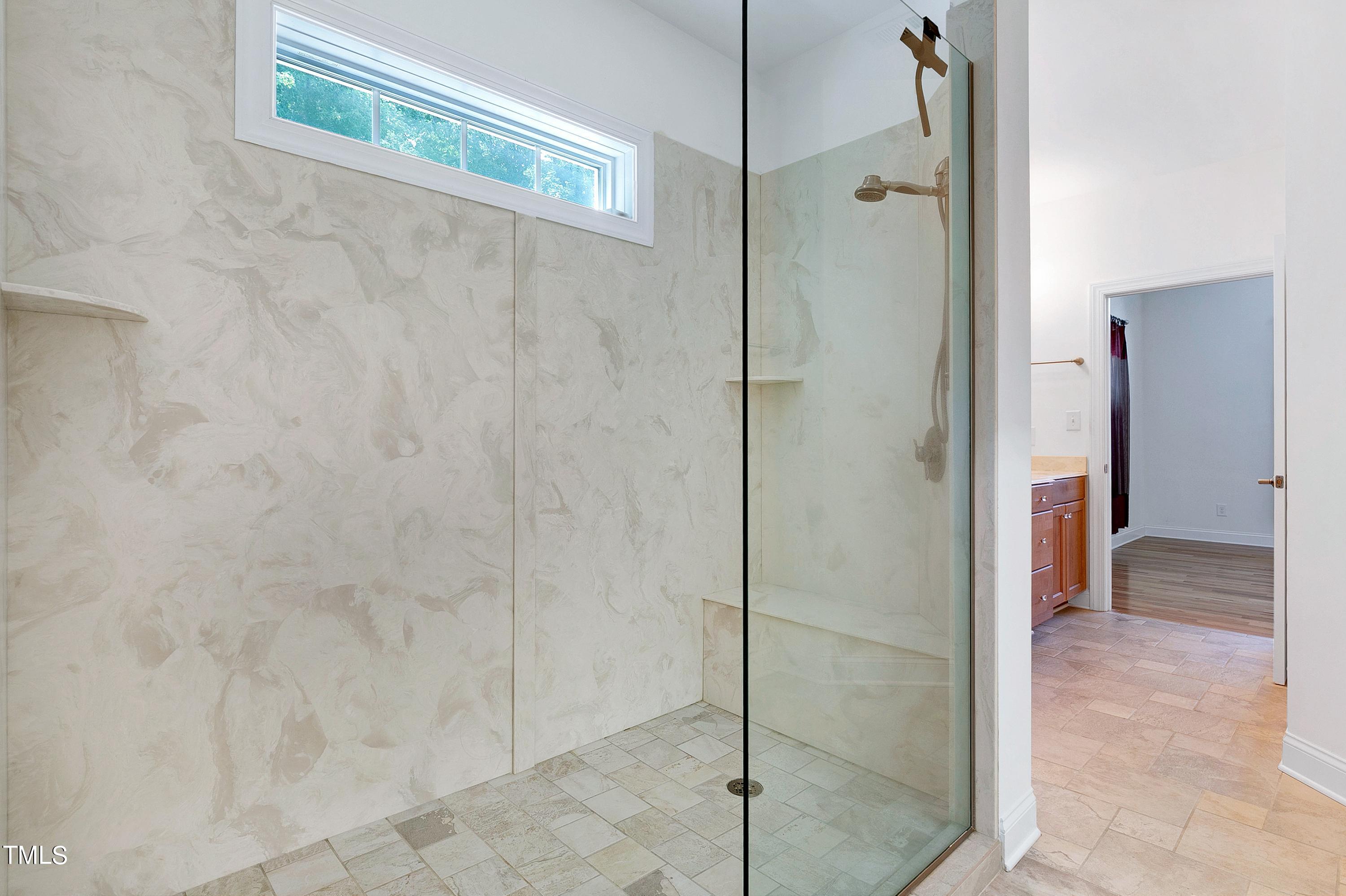 644 Uwharrie Ridge Road Chapel Hill, NC 27516 - Photo 26 of 43 Walk in zero entry shower