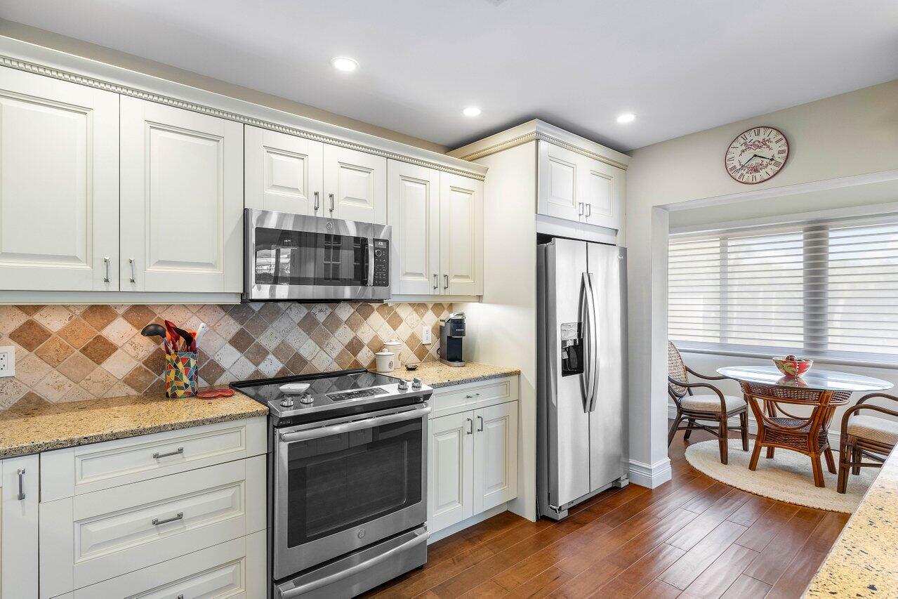 3675 Quail Ridge Drive, Unit BOBWHITE B Boynton Beach, FL 33436 - Photo 11 of 33 Kitchen