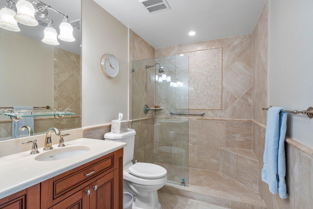 3675 Quail Ridge Drive, Unit BOBWHITE B Boynton Beach, FL 33436 - Photo 19 of 33 Main Bath shower area