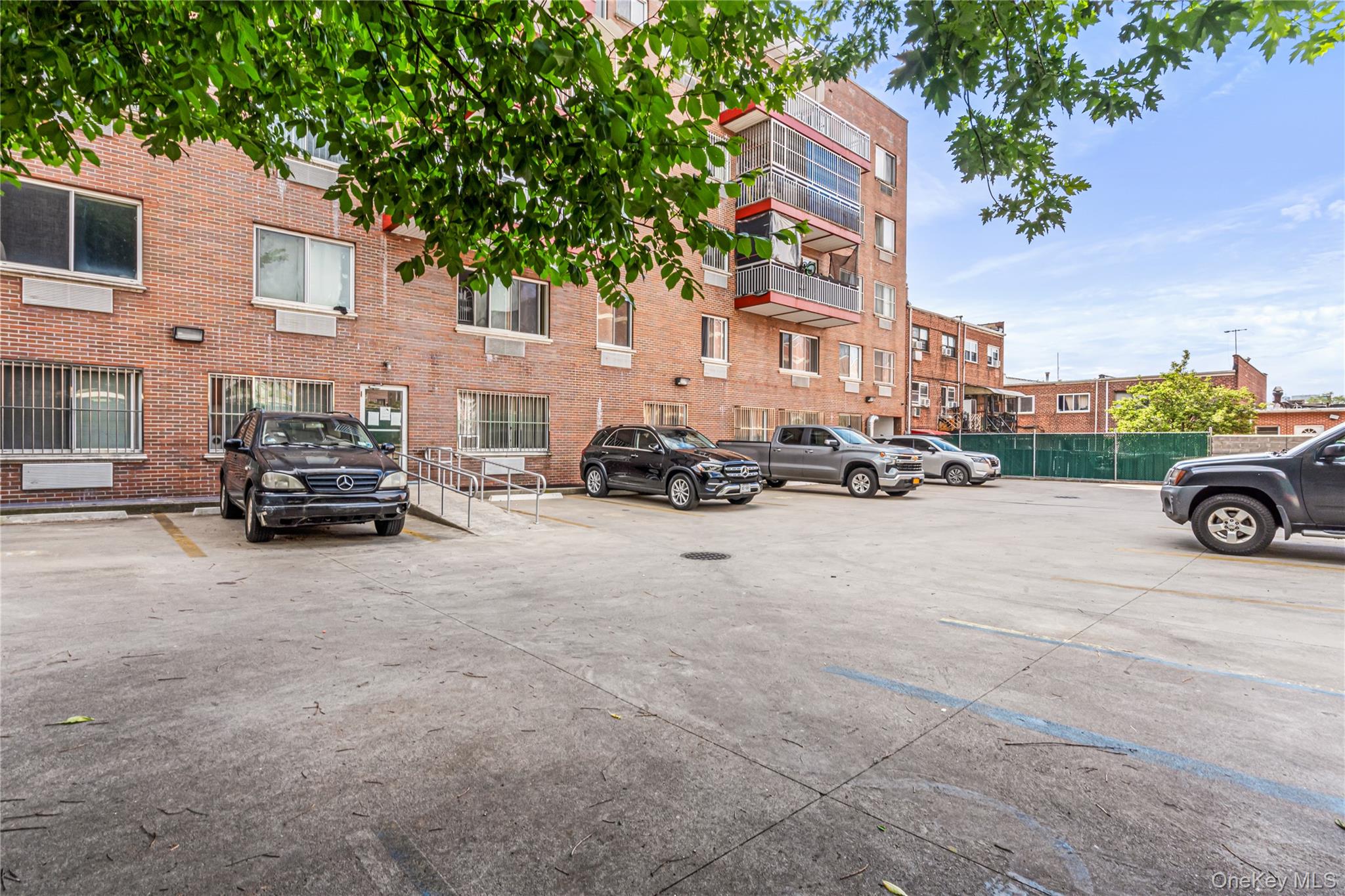 37-17 111th Street, Unit 4F Queens, NY 11368 - Photo 17 of 19 a car parked in front of a building
