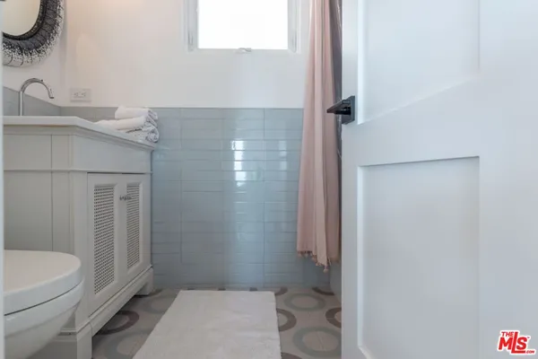 a view of a balcony with chairs