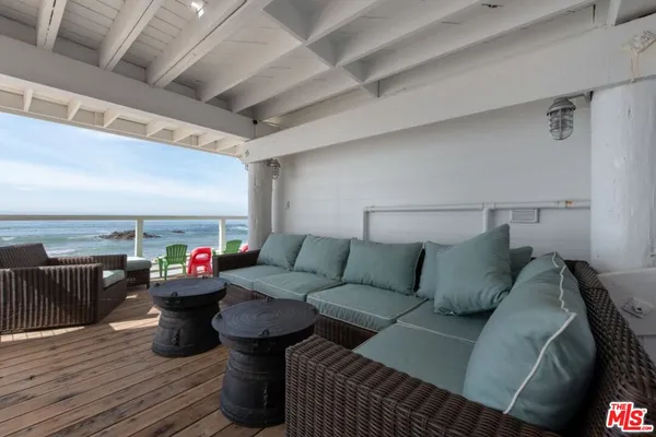 a view of hallway with wooden floor