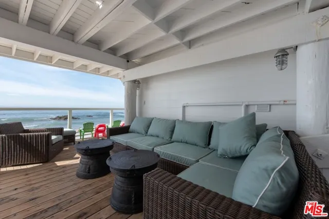 a view of hallway with wooden floor