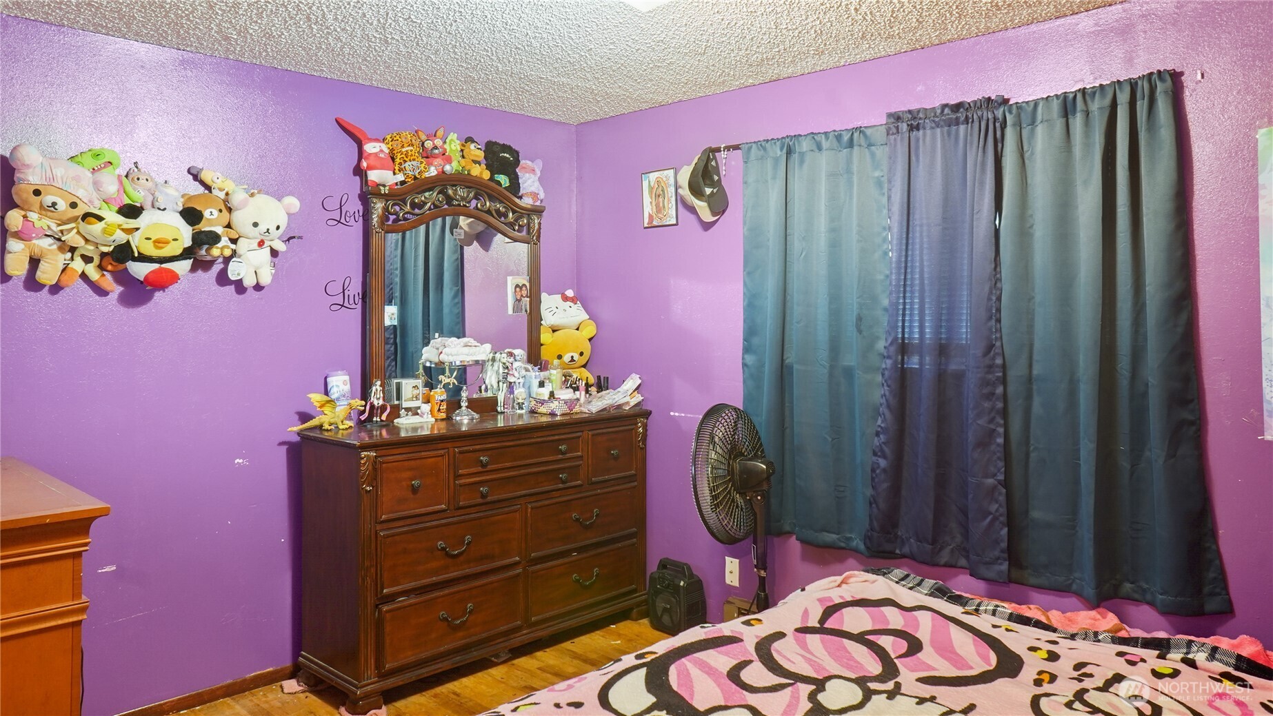 224 Calla Loop Northwest Royal City, WA 99357 - Photo 16 of 28 a bed room with a bed and a mirror