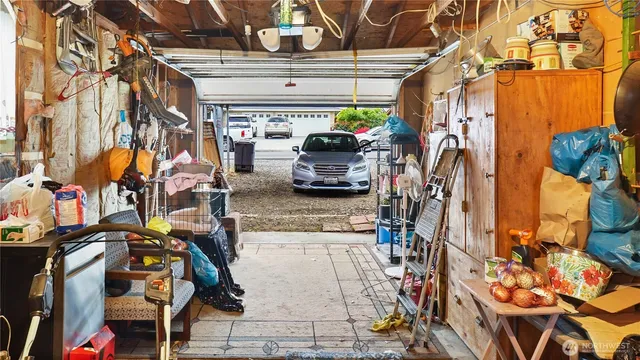 a view of parking garage with cars