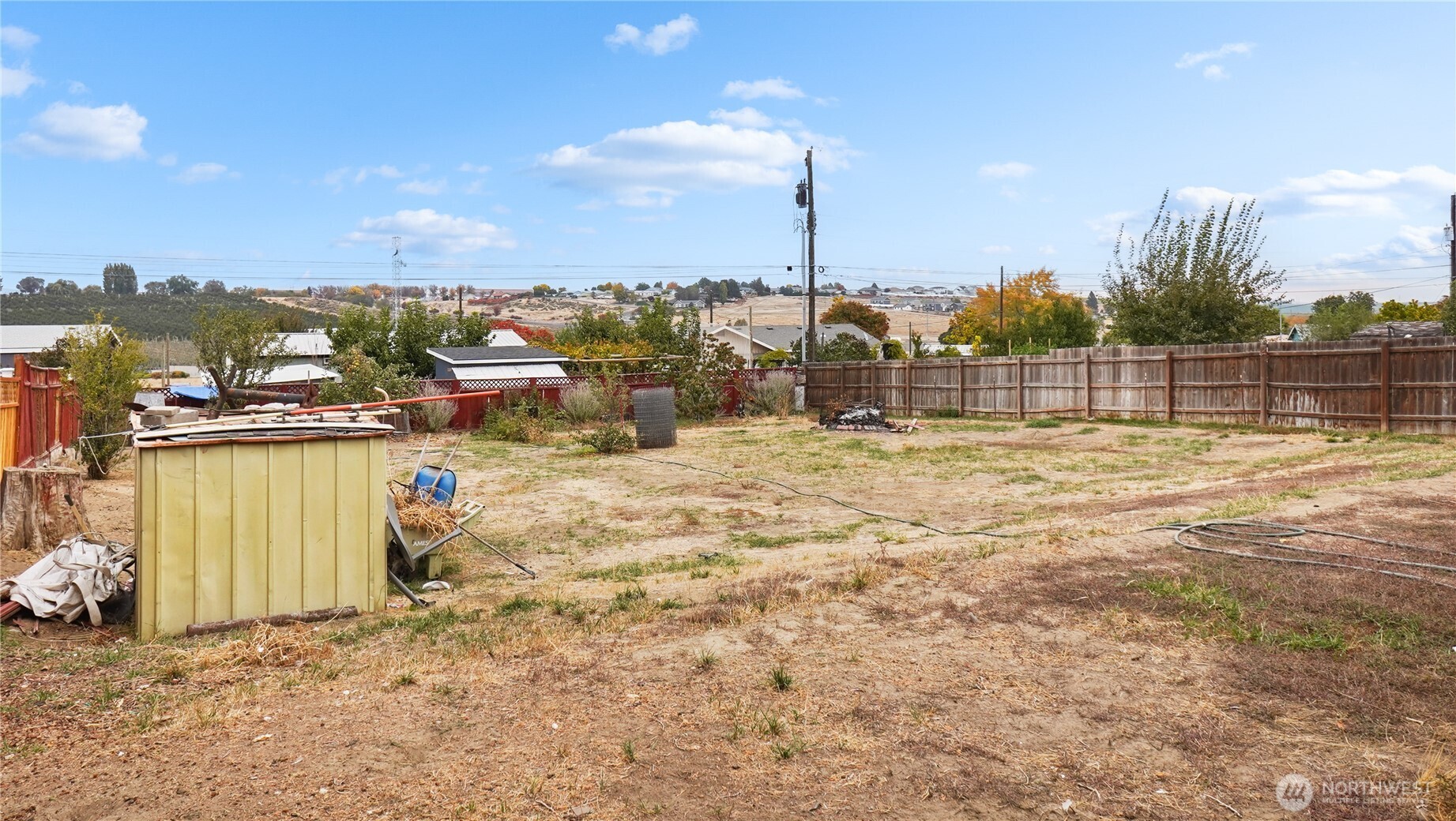 224 Calla Loop Northwest Royal City, WA 99357 - Photo 24 of 28 a view of a lake with a yard and mountain view