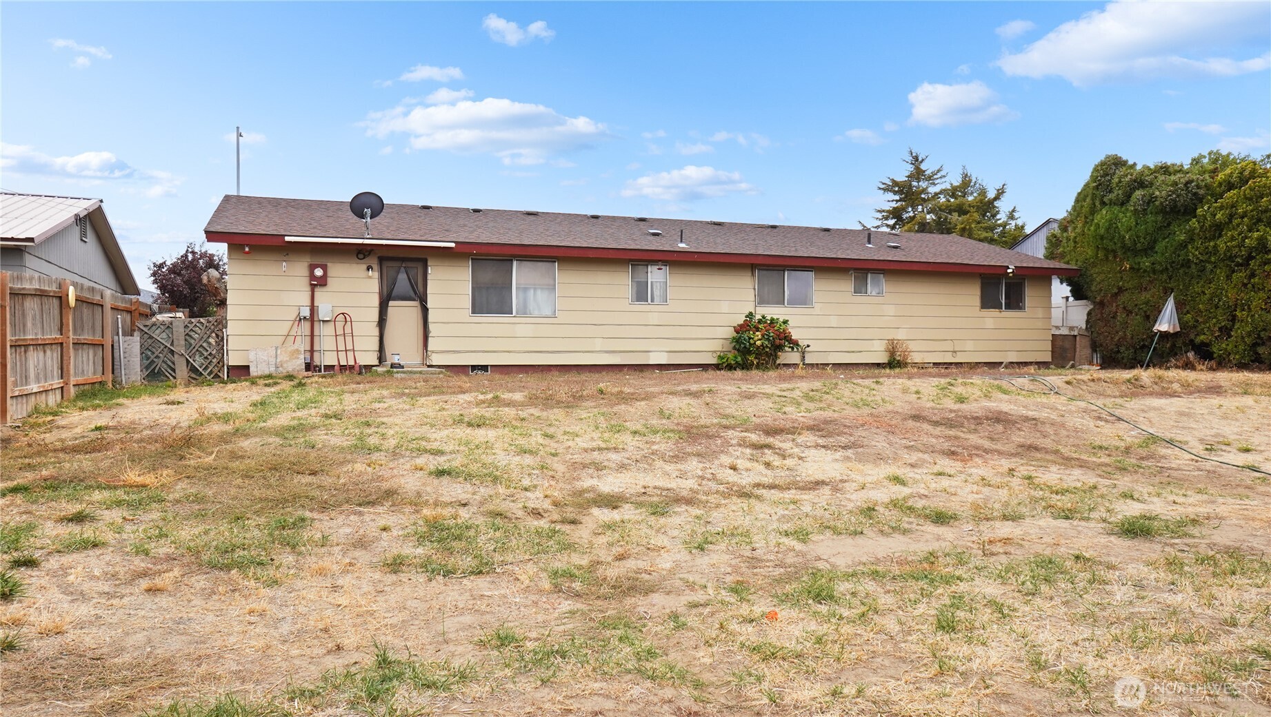 224 Calla Loop Northwest Royal City, WA 99357 - Photo 25 of 28 a house that has a lot of windows in it
