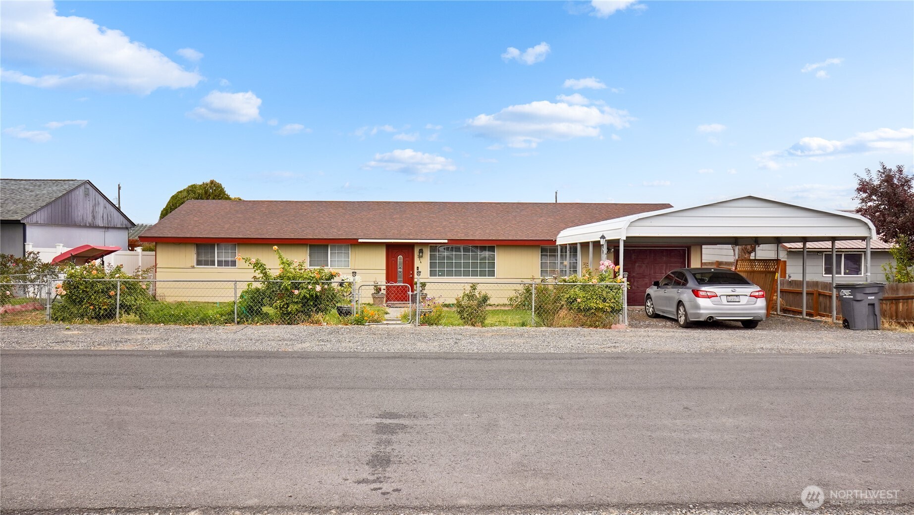 224 Calla Loop Northwest Royal City, WA 99357 - Photo 28 of 28 a car parked in front of a house