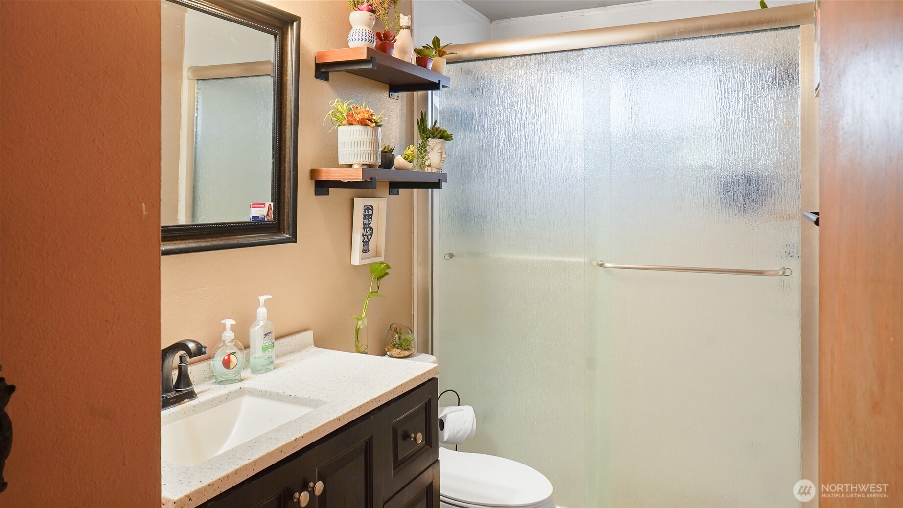 224 Calla Loop Northwest Royal City, WA 99357 - Photo 5 of 28 a bathroom with a sink vanity mirror and toilet