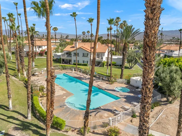 a view of an pool patio and mountain view
