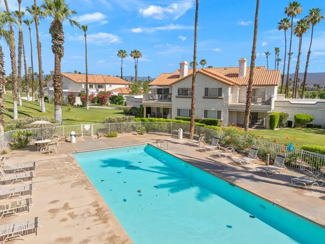 a bathroom with a sink a toilet and a shower