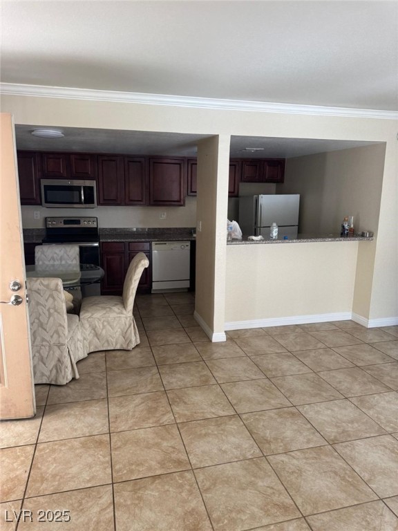 5021 River Glen Drive, Unit 41 Las Vegas, NV 89103 - Photo 6 of 12 Kitchen featuring appliances with stainless steel