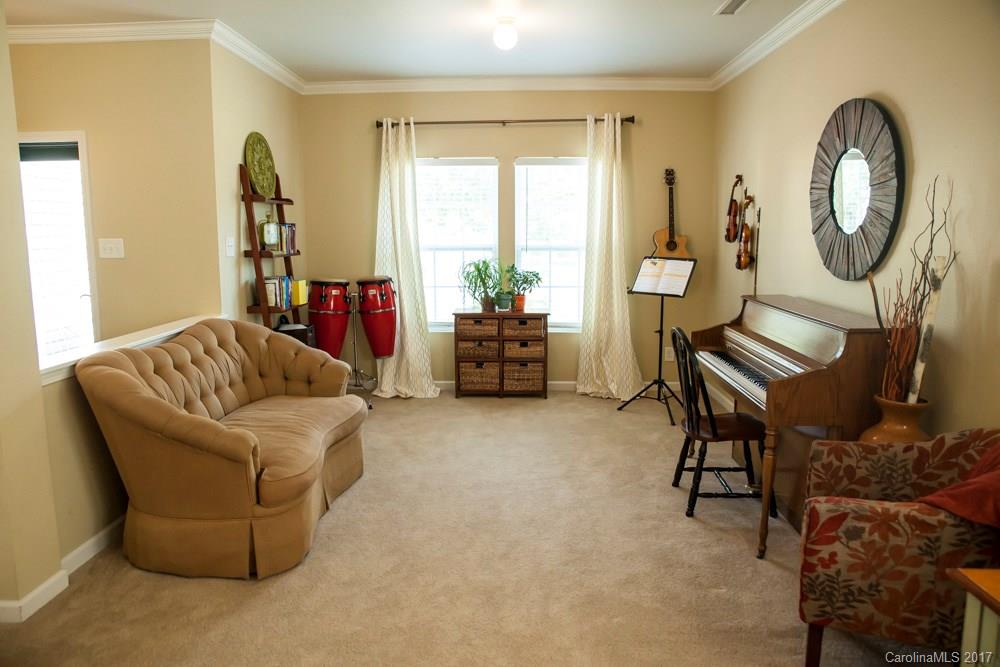 2069 Durand Road Fort Mill, SC 29715 - Photo 4 of 23 a living room with furniture and a large window