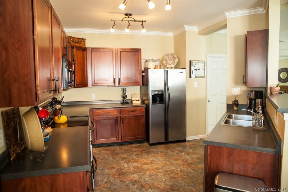 2069 Durand Road Fort Mill, SC 29715 - Photo 5 of 23 a kitchen with stainless steel appliances granite countertop a refrigerator and a sink