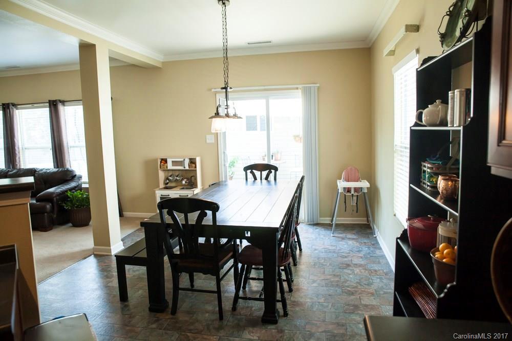 2069 Durand Road Fort Mill, SC 29715 - Photo 8 of 23 a view of a dining room with furniture