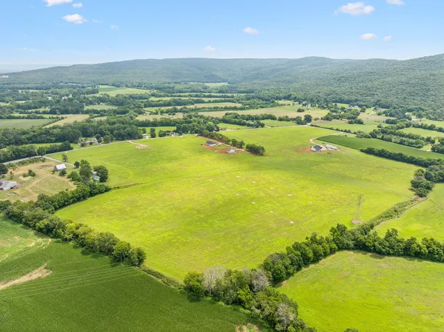 a view of an ocean and a yard
